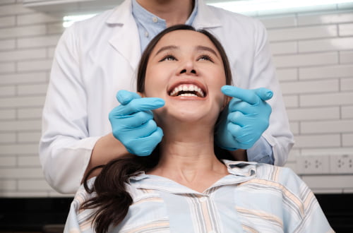 Patient at the dental clinic during cosmetic dental treatment related to porcelain veneers in Vaughan
