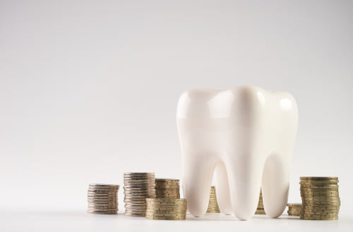 White tooth model representing dental financing and flexible payment options for cosmetic dentistry in Vaughan