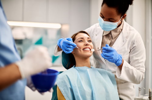 Woman having a dental check-up with a dentist in the Vaughan clinic