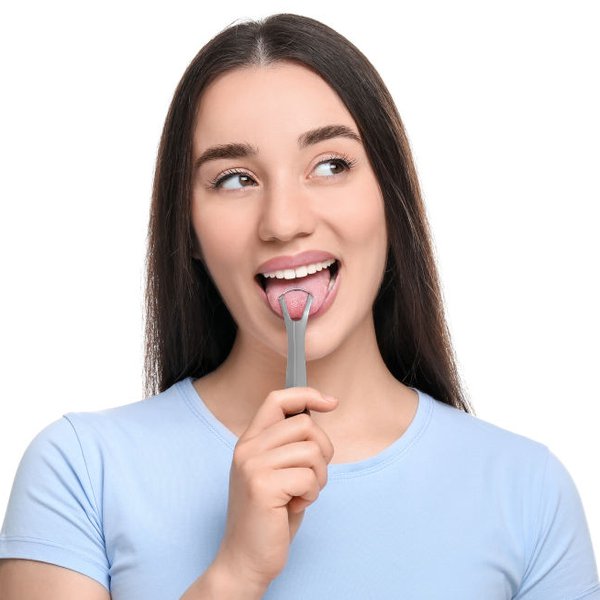 What Is Tongue Scraping and Does It Actually Work? A Dentist ...